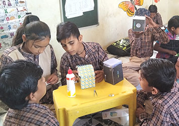 Three women leaders from a rural Self‑Help Group in Gujarat