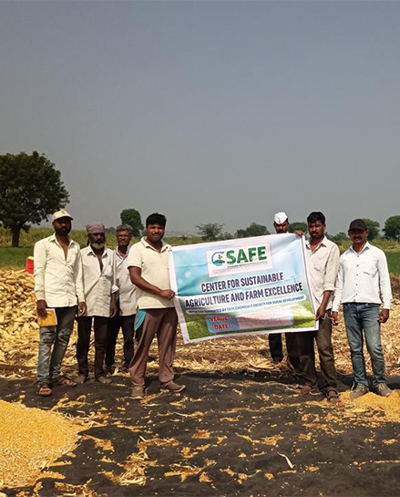 Farmer holding crate of produce