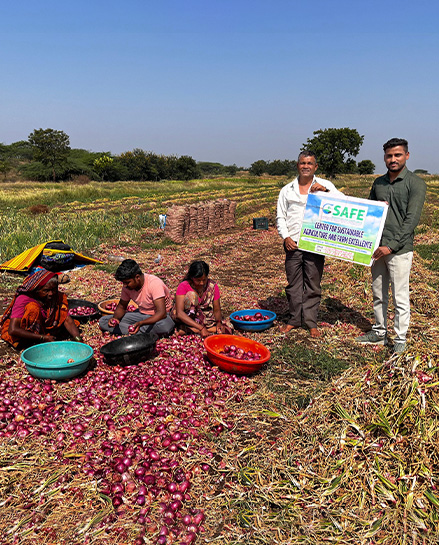 Farmer holding crate of produce